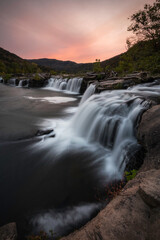 Sandstone Falls along the New River during a mid-October hazy and smokey sunset.