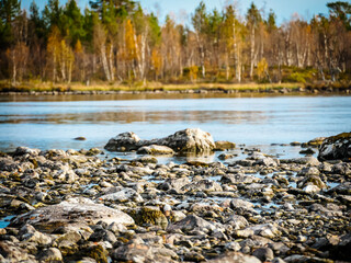 Fototapeta na wymiar The shores of rivers in Kiruna