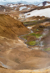 Hikers in the geothermal area of Hveradalir in the mountains of Kerlingarfjoll in the highlands of Iceland.