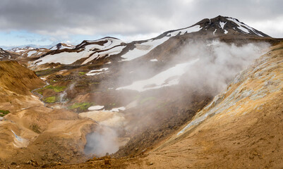Hikers in the geothermal area of Hveradalir in the mountains of Kerlingarfjoll in the highlands of Iceland.
