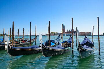 Gondolas with Church of San Giorgio Maggiore at background, Venice, Italy