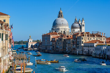 Fototapeta na wymiar Grand Canal with Basilica di Santa Maria della Salute at background, Venice, Italy