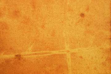 Old brown paper grunge background. Abstract liquid coffee color texture.