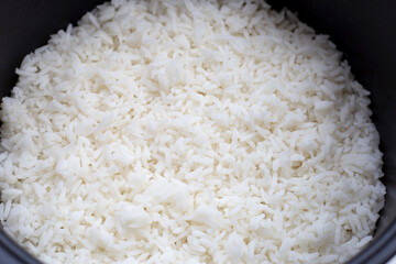 Rice in a rice cooker. Top view