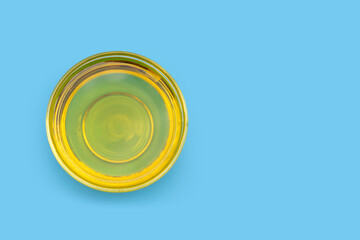 Rice bran oil on blue background.