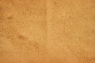 Fototapeta na wymiar Old brown paper grunge background. Abstract liquid coffee color texture.