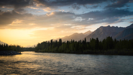 Golden light filling the Bow Valley in Canmore during an early Summer sunset.