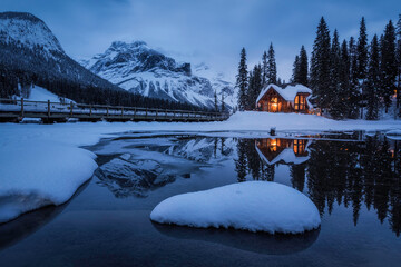 Evening blue hour reflections of the Cilantro Cafe of the Emerald Lake Lodge in Yoho National Park...