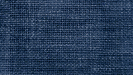 blue jean linen texture, burlap fabric as background. close up beige weaving or mesh fabric texture background. close up cotton or fabric fiber background.