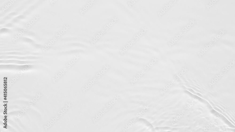 Poster up close, top view, various waves of the water surface hitting the sun's rays, making them sparkle a