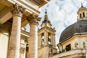 Fototapeta premium Italy, Rome. Piazza del Popolo, columns of Chiesa de Santa Maria del Montesanto, dome of Chiesa dei Miracoli.