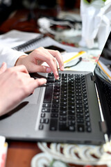 using laptop, in home office due to pandemic
