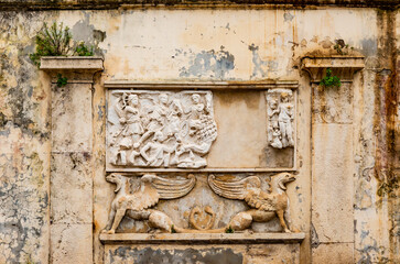 Italy, Rome, Pincio. Villa Borghese Gardens, twin wall fountains with lion statue on Viale del Lago.