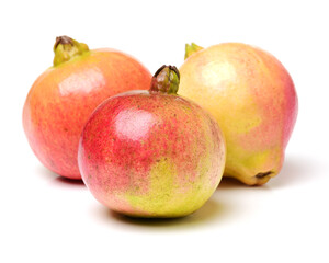 Ripe pomegranate fruit isolated on white background