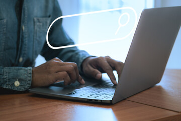 A business man searching for the internet on a laptop, Concept of search