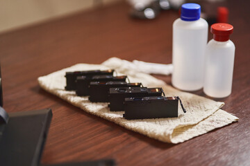 printer cartridges in the process of being cleaned and removed