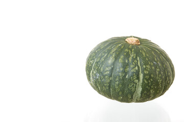 Green pumpkin on the white background