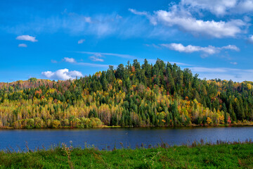 The autumn forests lakeside landscape.
