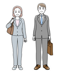 A man and a woman in suit standing with business bags in their hands