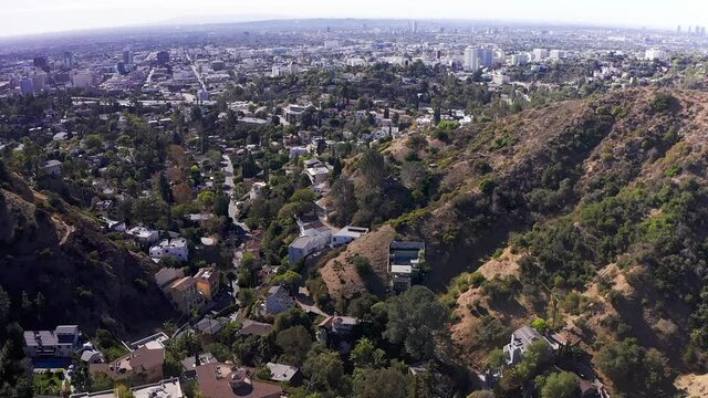 Aerial panning shot above the Hollywood Hills. 1080p at 60 FPS.