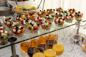Appetizing snacks on the table. Catering for business meetings, events and celebrations. Close-up.