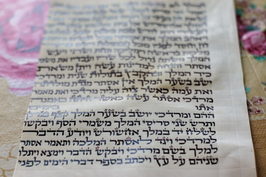 jerusalem-israel. 06-05-2020. Excerpt from the Book of Esther from the Bible, written on a handwritten cowhide sheet in Hebrew.