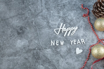 Happy new year writing on the grey marble background