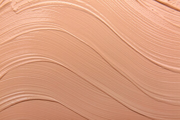 Makeup foundation as background, closeup