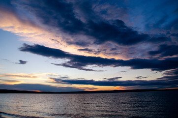 Dark clouds over the lake