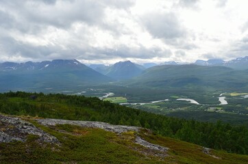Fototapeta premium beautiful maalselv valley settlement with the famous winding maalselv river running through the valley