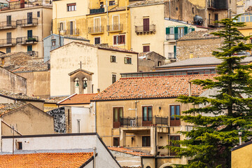 Fototapeta na wymiar Italy, Sicily, Province of Palermo, Prizzi. View of homes and buildings in the ancient hill town of Prizzi.