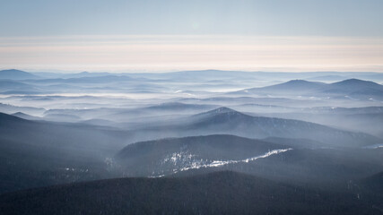 Fototapeta na wymiar landscape forest mountains and fog leave you far, background
