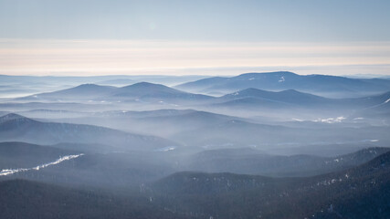 Fototapeta na wymiar landscape forest mountains and fog leave you far, background