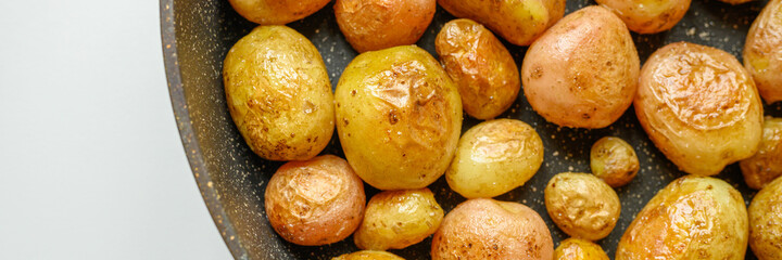 Roasted potatoes in the skin. banner