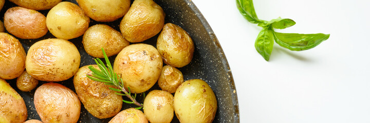 Golden roasted potatoes in the skin. banner