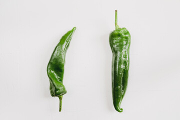 geen peppers on white background
