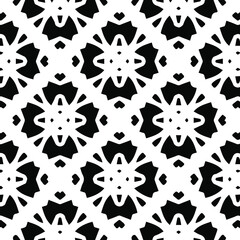 Geometric vector pattern with triangular elements. Seamless abstract ornament for wallpapers and backgrounds. Black and white colors.