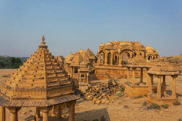 Golden Cenotaphs or Chhatris of Bada Bagh or Barabagh carved out of sandstone blocks, Jaisalmer, Rajasthan, India.