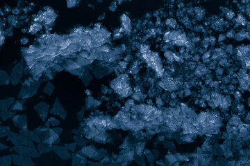 Aerial view of ice chunks in a sea