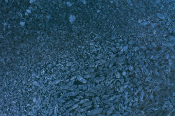 Aerial view of ice chunks in a sea