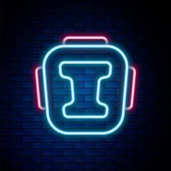 Glowing neon line Boxing helmet icon isolated on brick wall background. Colorful outline concept. Vector.