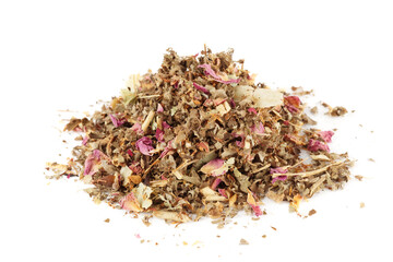 Herb and flower tea isolated on white