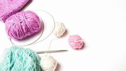 Color yarn balls and knitting needles