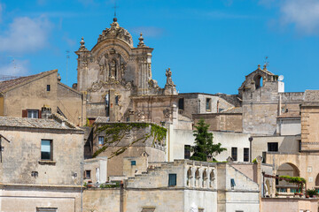 Italy, Basilicata, Province of Matera, Matera. Buildings dominated by the Church of Saint Francis...