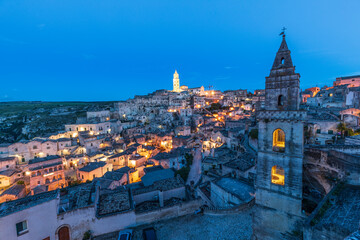 Obraz premium Italy, Basilicata, Province of Matera, Matera. View over the city with Chiesa San Pietro Barisano (Saint Peter Barisano church) in the foreground and the Cathedral or Duomo of Santa Maria della Bruna.