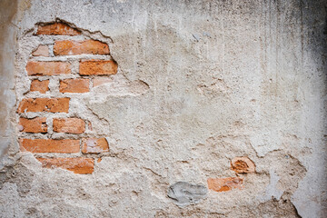 Old red brick wall texture Painted Distressed Wall Surface. Grungy Wide Brickwall