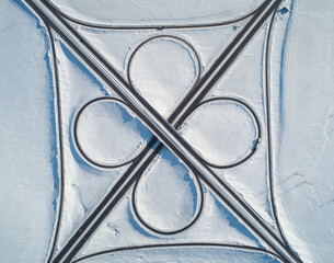 Clean highway road intersection in winter