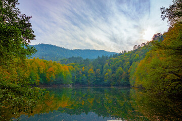 Fototapeta na wymiar HDR photo of Landscape of the forest at autumn and lake
