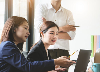 Start-up Business, a team of young entrepreneurs working together to increase profits into the company to increase business potential