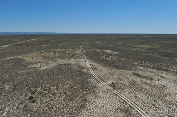 Zhambyl region, Kazakhstan - 05.17.2013 : The road runs along a wide valley with sandy and rocky...